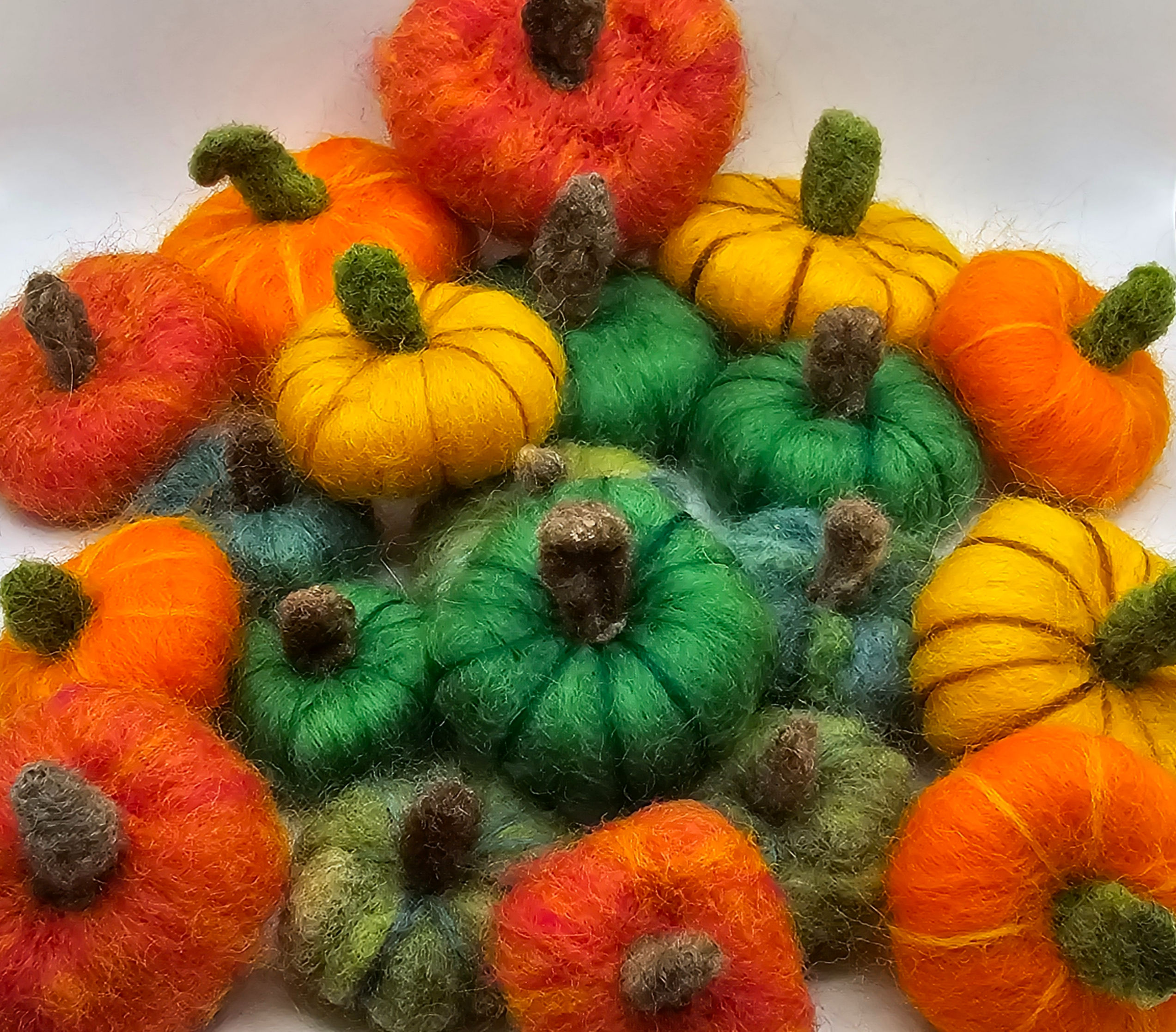 Colorful felted pumpkins, various sizes and colors, for fall decorations. Ferennials Online.