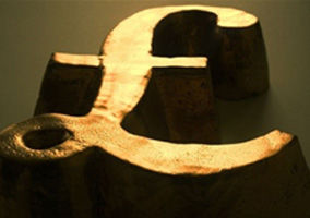 Title : Pound Little Changed at $1.1