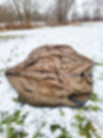 An image of a tent that is stretched out on the ground.