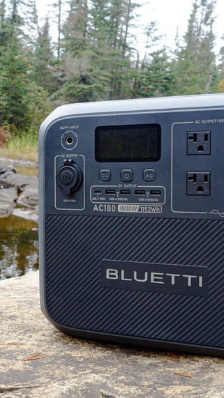 The Bluetti AC180 Portable Power Station outside