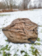 An image of a tent that is stretched out on the ground.