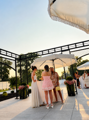 Guests gathering on the outdoor terrace during cocktail hour at Westwood, Vowery and Estate in Westfield, Indiana