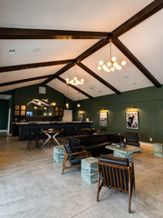 Elegant wedding reception space with vaulted ceilings and chandeliers at Westwood, Vowery and Estate in Westfield, Indiana
