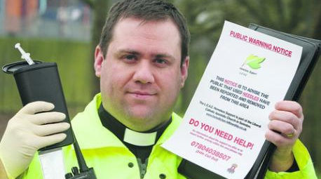 Father Mark Paris Haines calling on local leaders in Swindon Town Center