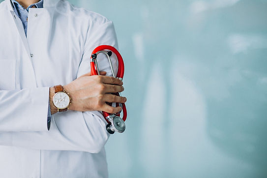young-handsome-physician-in-a-medical-robe-with-stethoscope_edited.jpg