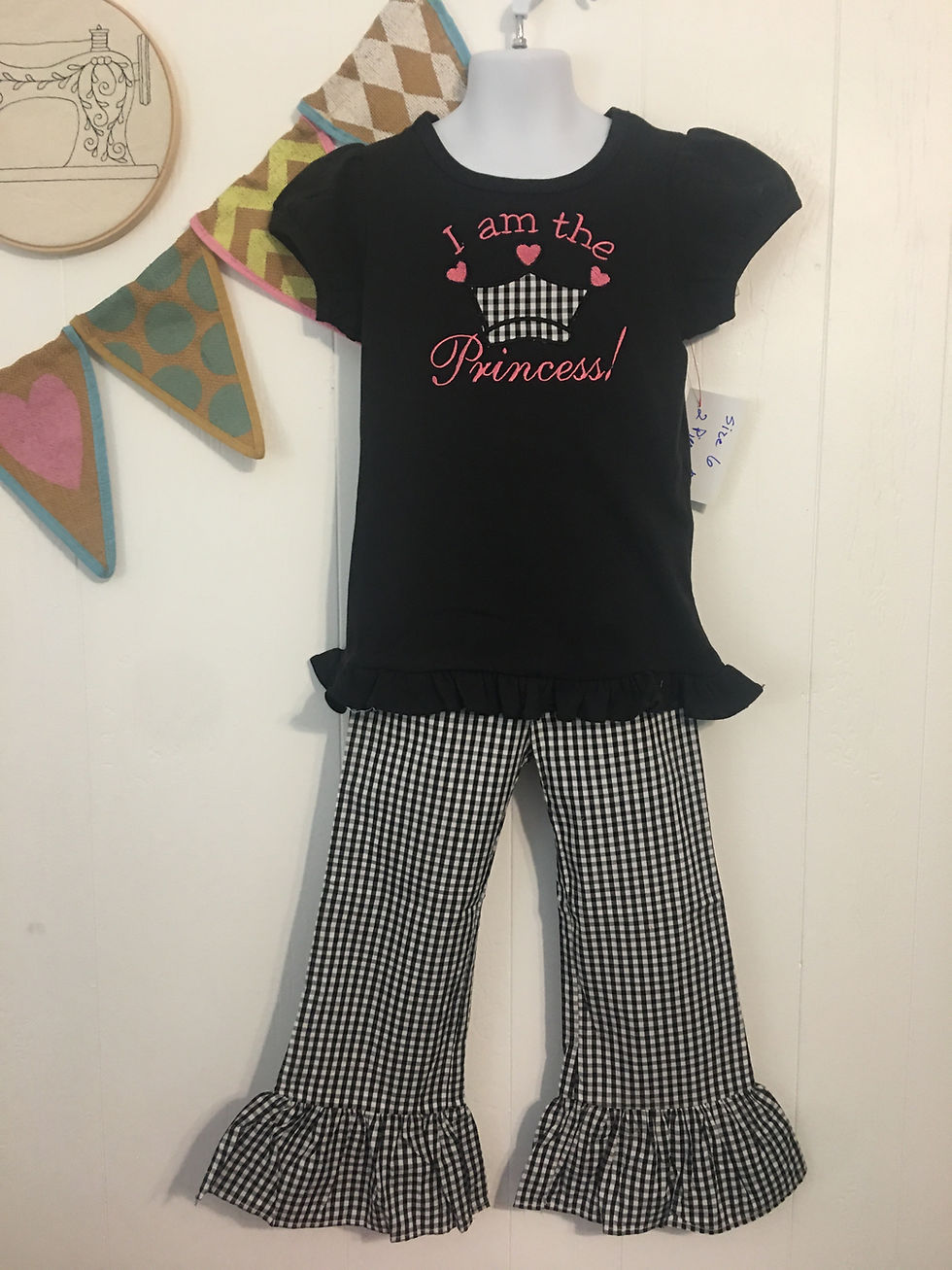 Girls size 10 girl’s appliquéd top with seersucker pants.