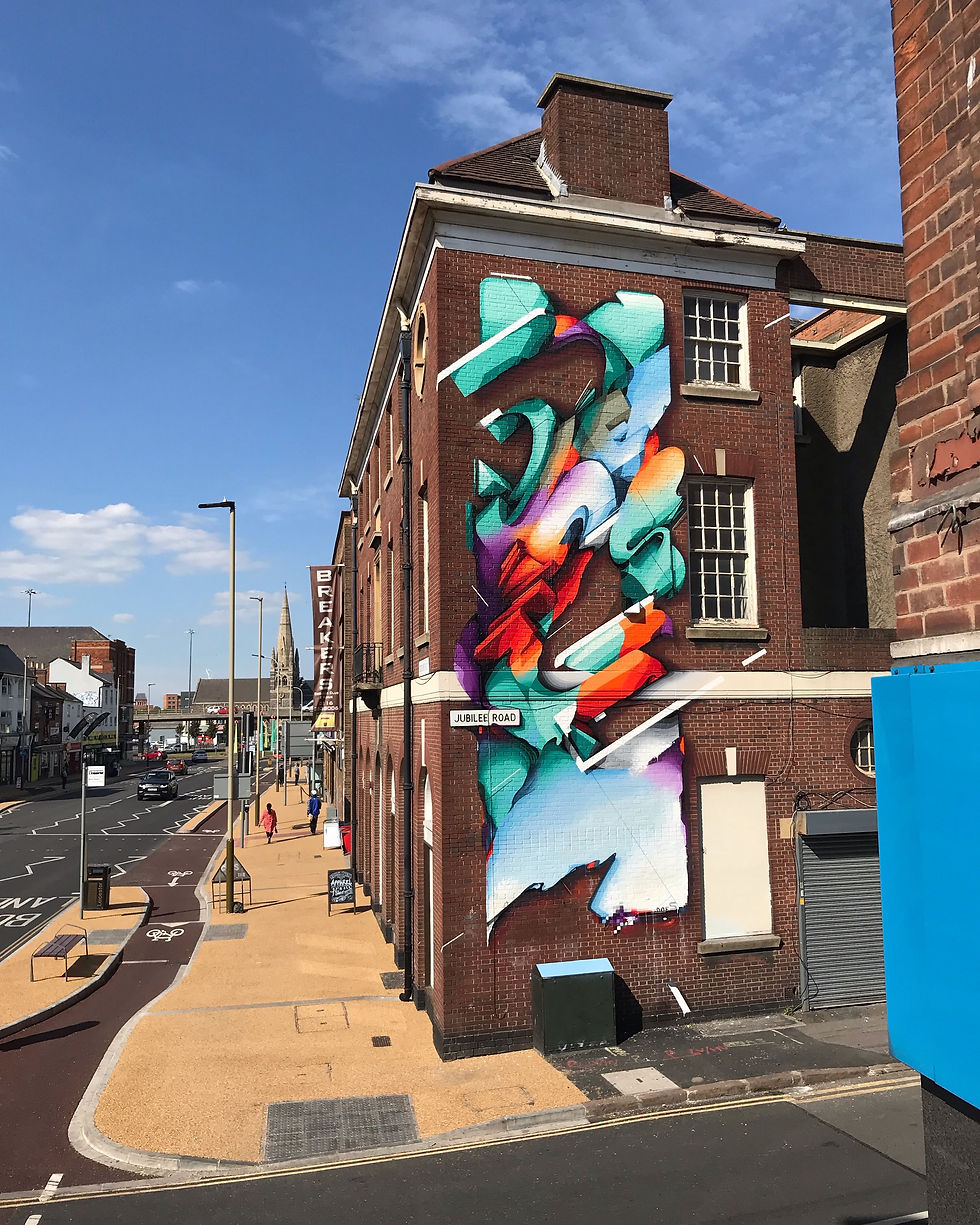 A Bring the Paint mural brightens up a stretch of Leicester street