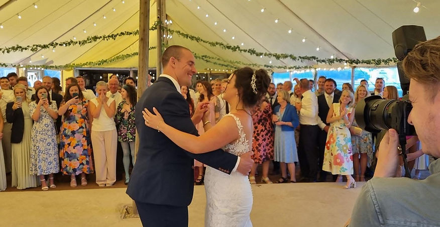Bride and groom sharing their first dance at a Gloucester wedding with Missing Cat Trio performing live