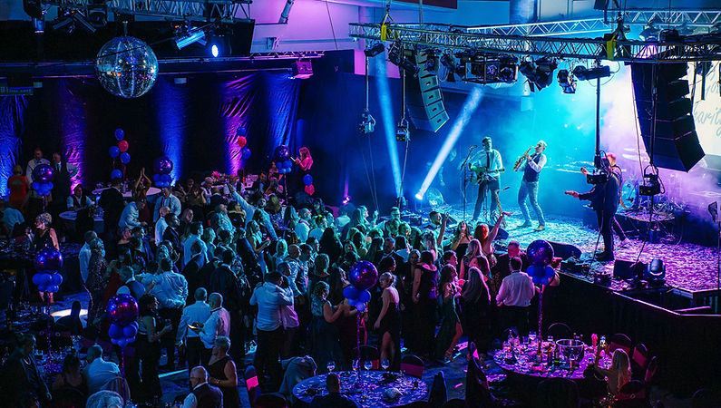live Bath wedding band performing at wedding reception with packed dance floor