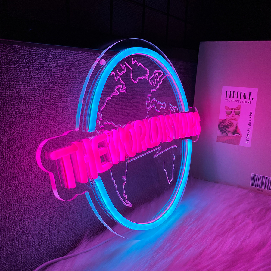 Close-up of the glowing neon globe detail