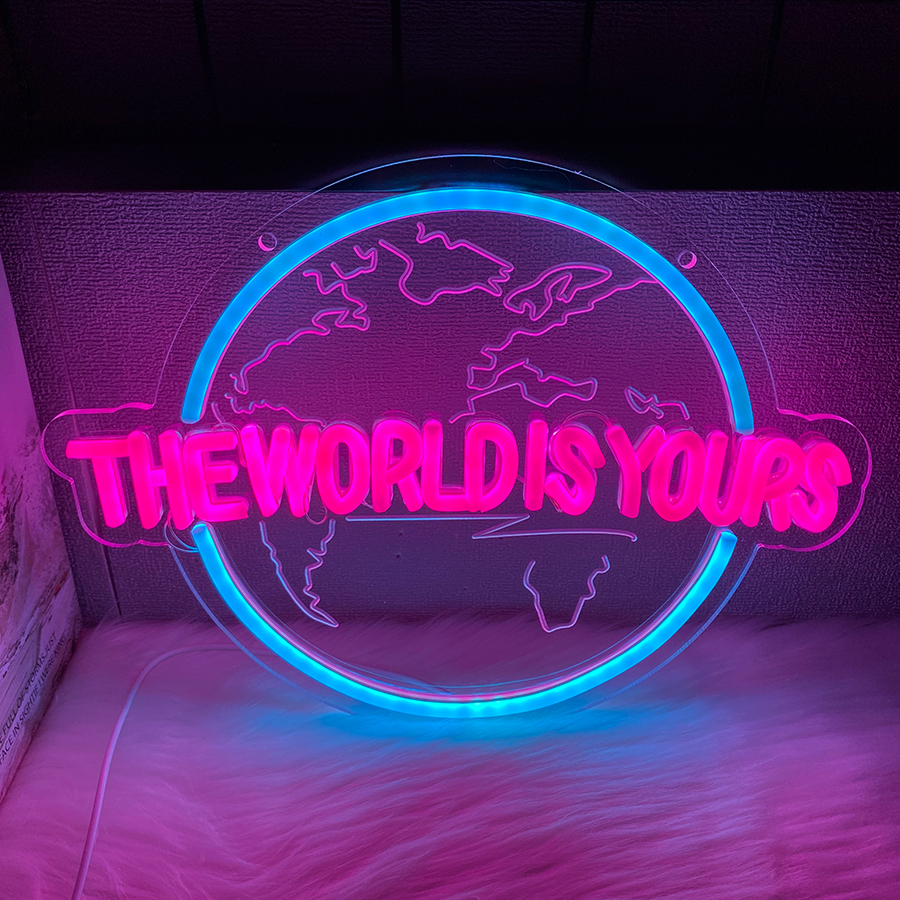 The World Is Yours Earth-shaped LED neon sign glowing on a dark wall
