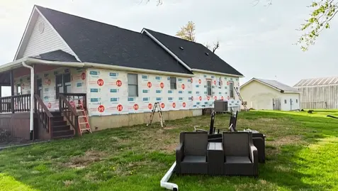 Side of the home prepped and ready for its new modern look.