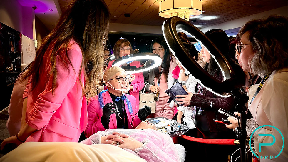 Brian Ho performing a live permanent makeup demonstration during an international PMU conference, sharing advanced techniques with beauty professionals and educators