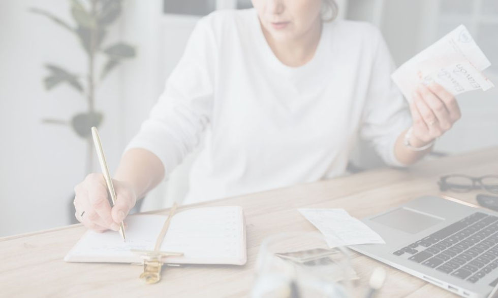 Small business owner documenting expense receipts