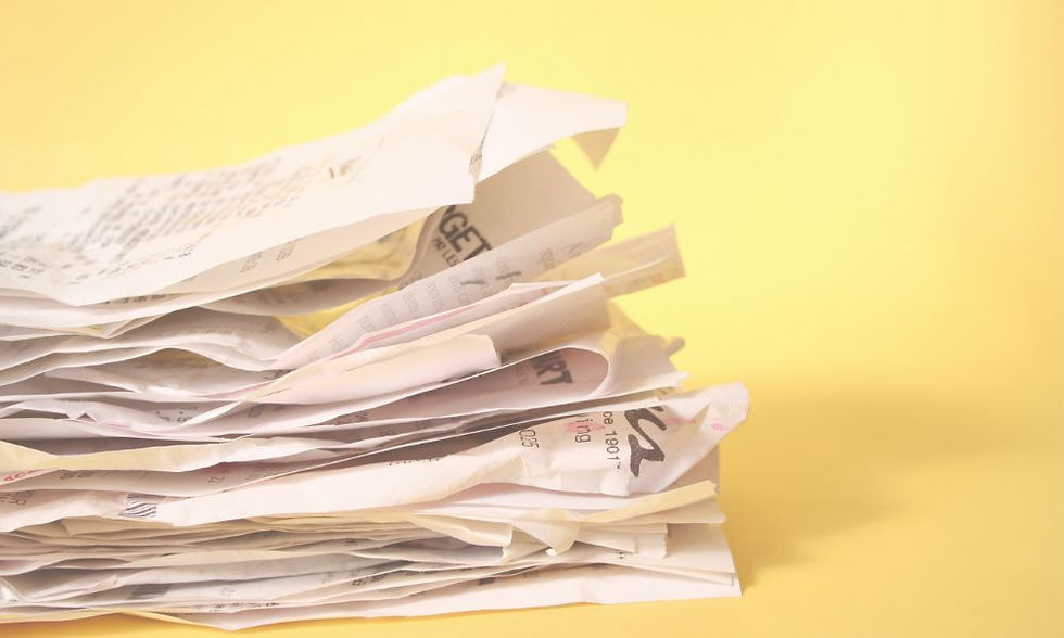 Business receipts on a yellow background