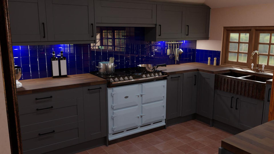 Grey shaker kitchen with blue glass splashback and quartz worktops in Essex