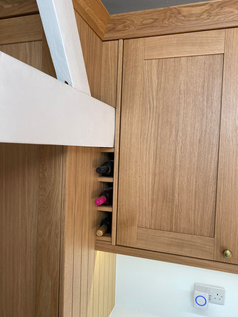 Belfast sink in oak shaker kitchen