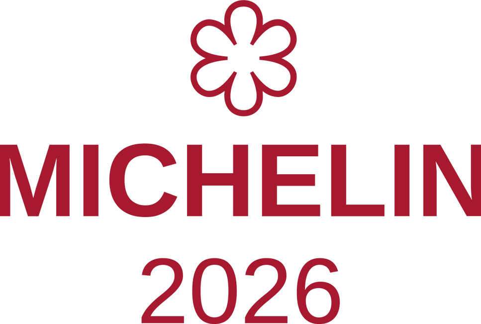 Logotipo oficial de estrella MICHELIN 2026 que distingue al restaurante PABÚ en Madrid.