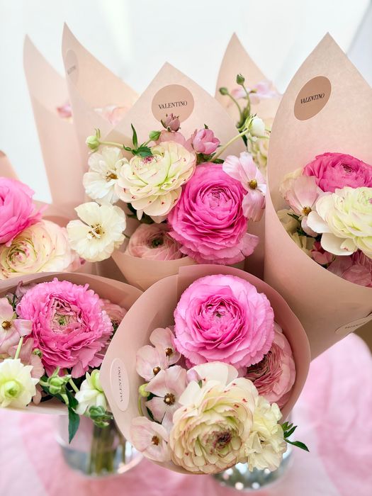 Close-up of sculptural ranunculus arrangement designed for Maison Valentino collaboration