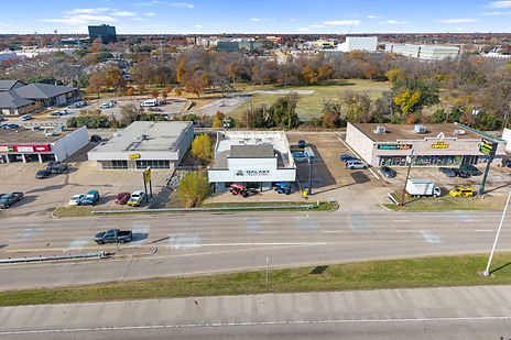 Drone aerial of a US-75 retail corridor in Plano, TX