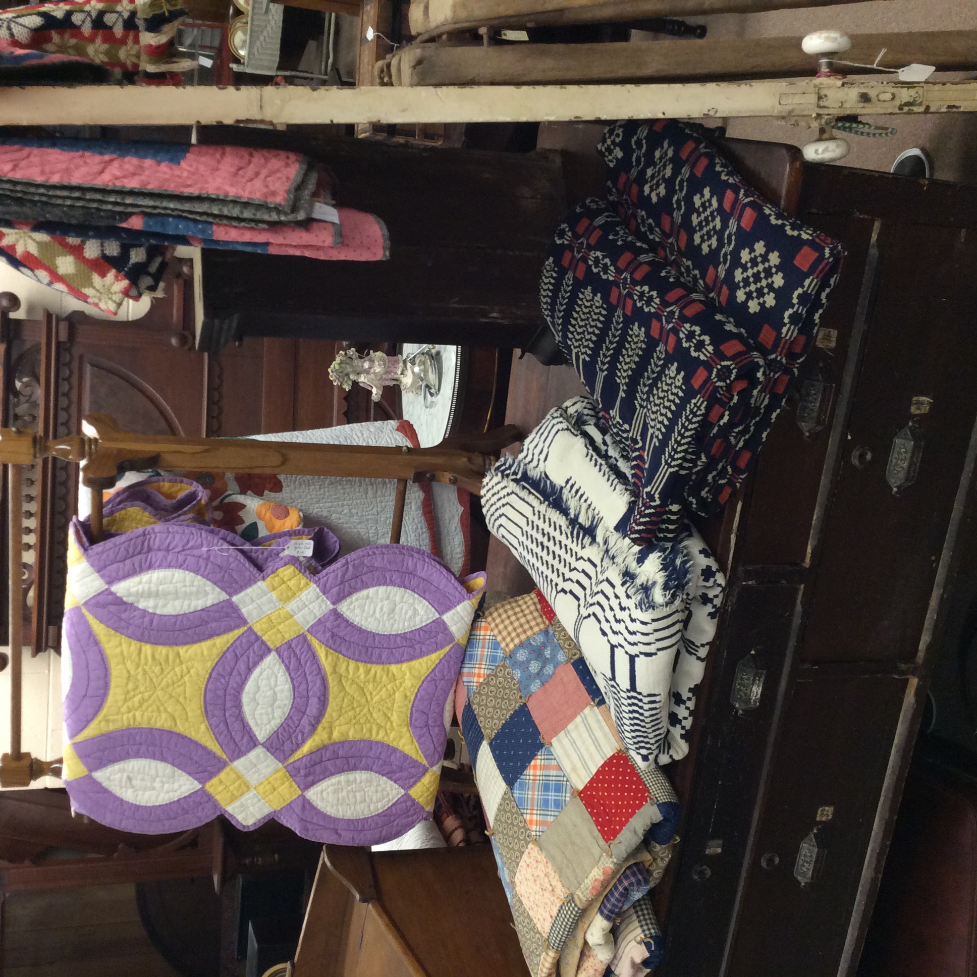 Various quilts and coverlets