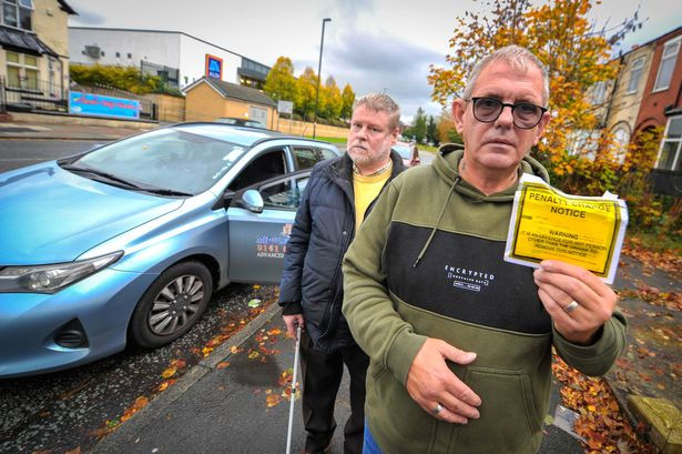 Gary Fox and passenger Lenny Nicholson (Image: Vincent Cole - Manchester Evening News)