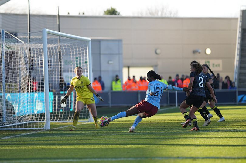 Manchester City's Khadija Shaw in action taking a shot during the WSL match