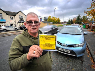 Taxi driver left fuming after receiving parking ticket while helping blind passenger
