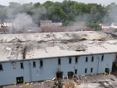 Demolition has begun on a storage world building in Middleton