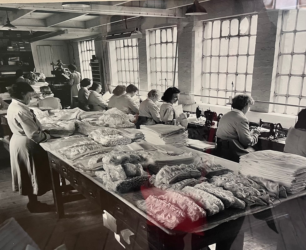 Seamstresses in the sewing room at Newman Brothers
