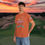 Thumbnail: orange tee shirt with I though growing old would take longer using retro 1970's letters