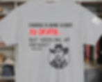 gray tee shirt with Courage is Being Scarred to Death But saddling up anyway with a cowboy image at the bottom of the design