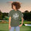 Thumbnail: green tee with a fishing graphic with O'Fishally Retired Not My Problem Anymore