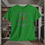 Thumbnail: Irish green tee shirt with "My Chains are Broken I have been set free" in gray letters an orange cross between broken chains