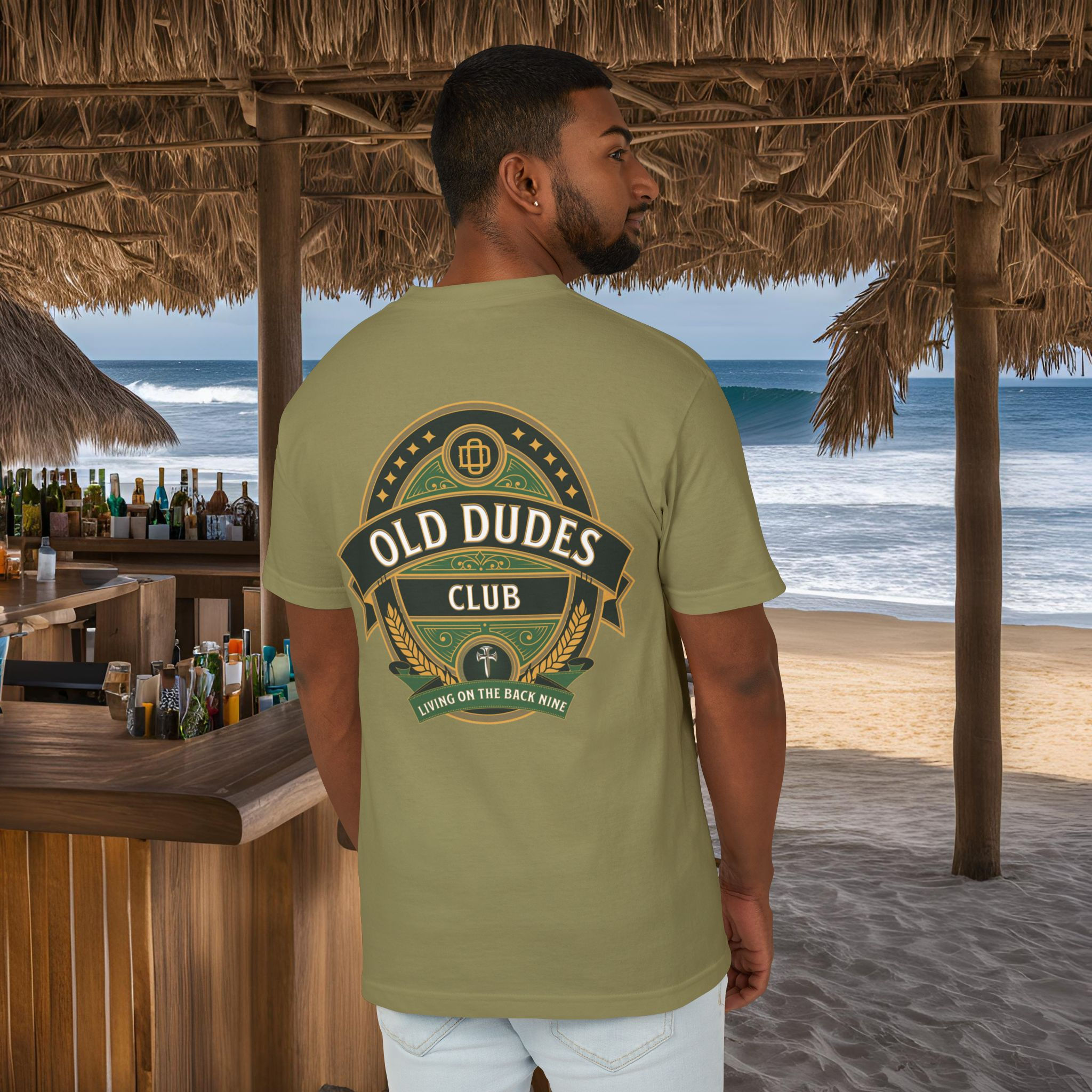 green tee shirt with a green and black British style Pub logo with Old Dudes printed in white letters arching in the center