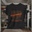 Thumbnail: black tee With Orr Road Knucklehead Outlaw printed in black and orange lettering on the front of the tee