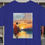 Thumbnail: cobalt tee shirt with an image of a sunset with an image of Jesus walking into the sunset with verse John 14:5 in red letters