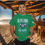 Thumbnail: green tee with The Full Armor Of God printed in blue and silver also an image of a Knight's Armor