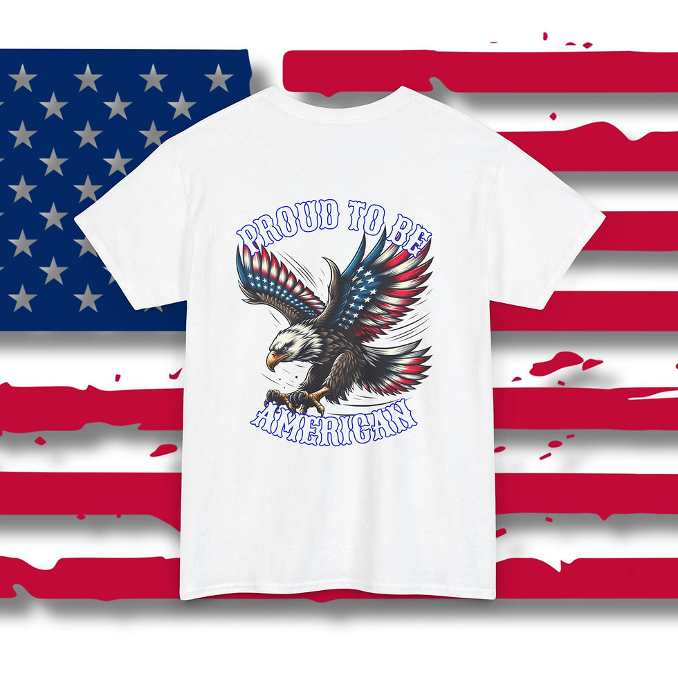 white tee with a graphic of an eagle in red white and blue colors Proud To Be American Printed above and blow the eagle