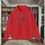 Thumbnail: red hoodie with Godfidence, Knowing I Can't But He can printed in black with large 3 nail style cross