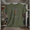 Thumbnail: green tee shirt with "My Chains are Broken I have been set free" in gray letters an orange cross between broken chains
