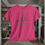 Thumbnail: pink tee shirt with "My Chains are Broken I have been set free" in gray letters an orange cross between broken chains