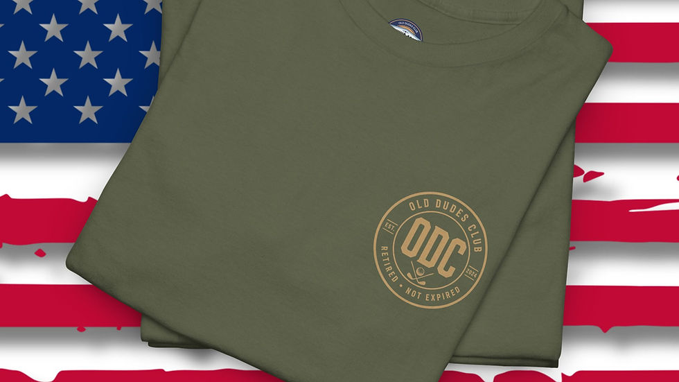 Thumbnail: folded military green  tee with an Old Dudes Club circular logo in tan printed on the upper left chest