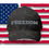 Thumbnail: dark camo baseball style cap with FREEDOM in Black Ops font in gray embroidered across the front