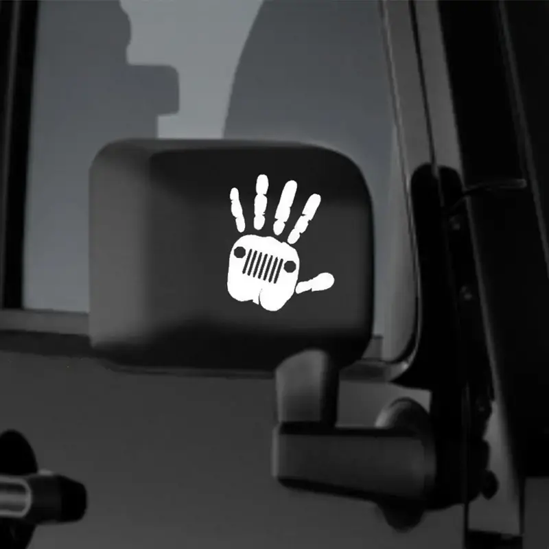 Thumbnail: White hand print with Jeep logo sticker on black side mirror