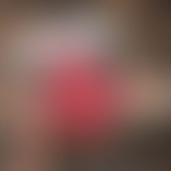 A copy of the Niab Annual Fruit Review magazine 2025 on a dark wooden table with a cup of coffee. The magazine has raspberries on the cover.