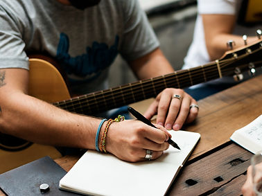 musicians-collaborating-on-music-writing-lyrics-to-2026-03-18-08-25-59-utc_edited.jpg