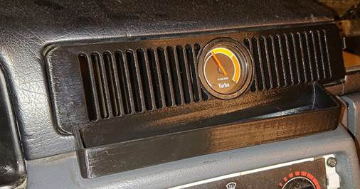 Second gen 740/ 940 Center ventilation with gauge and coin/ penholder integrated