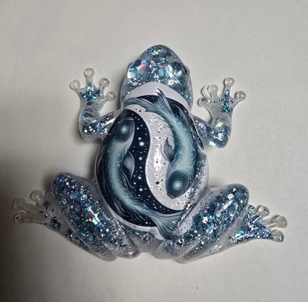 Hand-poured blue resin Pisces zodiac frog sculpture
