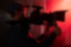 man-filming-with-professional-camera.jpg